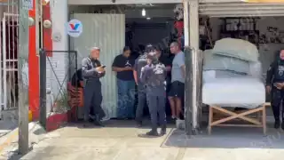 Sujetos armados disparan contra fachada de un taller de motos en Cancún