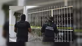 La vivienda cateada en la que operaba la secta de explotación sexual de menores 'Cuatro Caminos' en Chetumal, quedó asegurada tras la diligencia