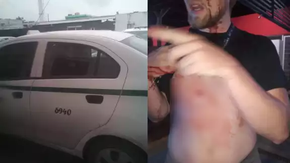 La mujer publicó fotografías del taxi y de la agresión que sufrió su pareja por defenderla del asalto