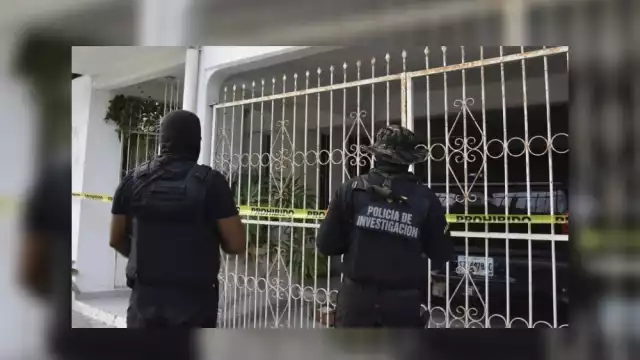La vivienda cateada en la que operaba la secta de explotación sexual de menores 'Cuatro Caminos' en Chetumal, quedó asegurada tras la diligencia