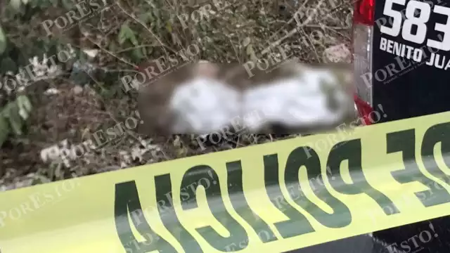 Policías acordonaron la zona donde fue hallado el hombre con signos de violencia en Cancún, para las investigaciones pertinentes