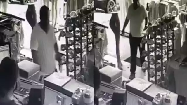 En la grabación de las cámaras de seguridad se ve al hombre intentando cambiar el cheque robado en Belice