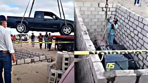 El ataúd del hombre fue colocado en la cajuela del vehículo y se utilizó una grúa para enterrarlo El ataúd del hombre fue colocado en la cajuela del vehículo y se utilizó una grúa para enterrarlo