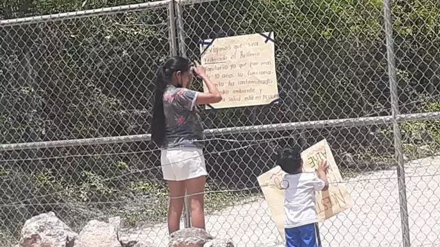 Más de 50 personas de las comisarías de Subín y San Antonio Tehuitz, así como vecinos cercanos al basurero, con pancartas y gritos exigieron a Sana que suspenda la quema de desperdicios