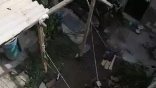 Elementos policiales hallaron tres cuerpos en un domicilio de la colonia Potrero del Rey en el municipio de Ecatepec.