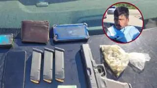 A los asegurados les decomisaron un arma de fuego presuntamente calibre .9 milímetros, tres cargadores y una bolsa con cartuchos