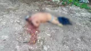 Peritos de la Fiscalía General del Estado, acudieron al sitio para realizar el levantamiento del cadáver