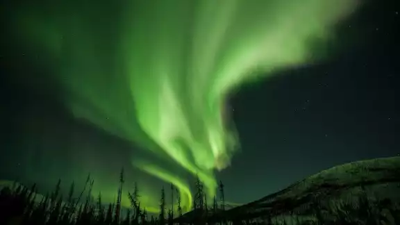 En la Tierra las auroras boreales pueden observarse en el extremo norte del planeta En la Tierra las auroras boreales pueden observarse en el extremo norte del planeta