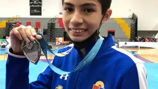 Oliver Gaspar Flores Cauich ganó la medalla de plata en la categoría Cadetes, división menos de 45 kilogramos  