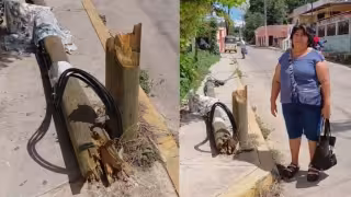 Poste de Telmex lleva 15 días tirado en Hopelchén y obliga a peatones a caminar entre vehículos