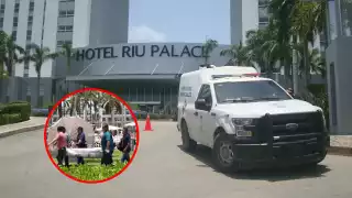 Agentes de la SSC utilizaron paraguas para intentar evitar que el cuerpo fuera fotografiado