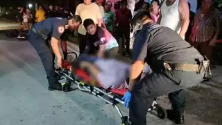Choque entre bicicleta y motocicleta deja a dos lesionados en Sacapuc, Motul