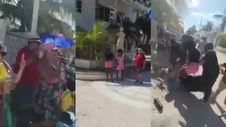 Manifestación contra extranjeros termina en golpes y mordidas en Chelem: VIDEO