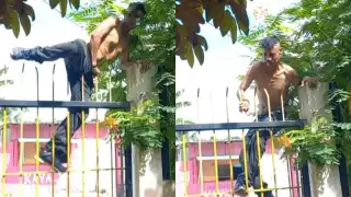 El dueño de la vivienda captó al hombre saliendo por la reja