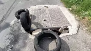 En la calle 12 Norte, cerca de la vialidad 45 Norte, lleva más de un año.