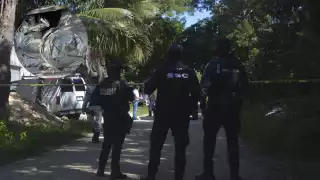 El vehículo también tenía impactos producidos por proyectil de arma de fuego