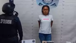 Detienen a una mujer armada y con drogas en Playa del Carmen