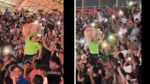 La gente aplaudía y gritaba con los pasos de la vendedora La gente aplaudía y gritaba con los pasos de la vendedora