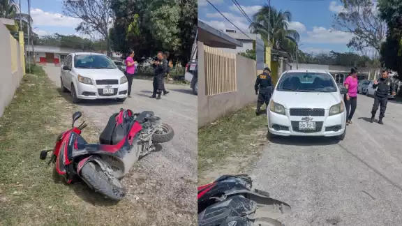 El auto no respetó el alto y chocó al motociclista El auto no respetó el alto y chocó al motociclista