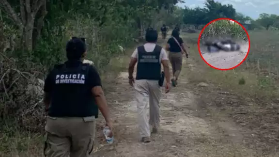 El cuerpo se encontraba envuelto en bolsas negras con un mensaje dirigido a personas dedicadas al robo de terrenos El cuerpo se encontraba envuelto en bolsas negras con un mensaje dirigido a personas dedicadas al robo de terrenos