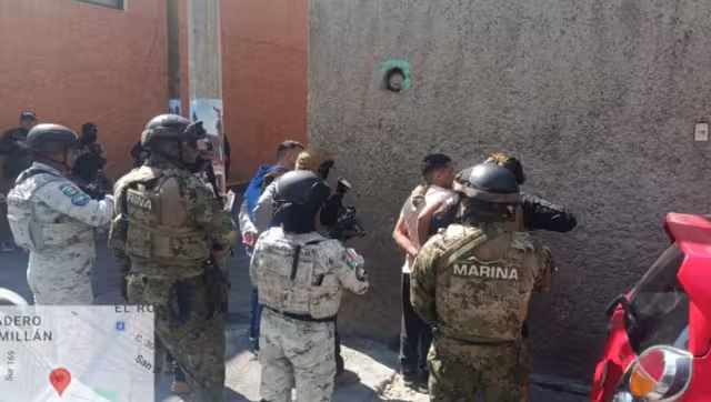 Marina informa la detención de dos sujetos con arma de fuego y droga en la CDMX.
