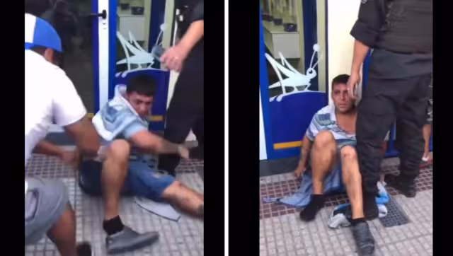 El hombre se abrazaban de la pierna de un policía