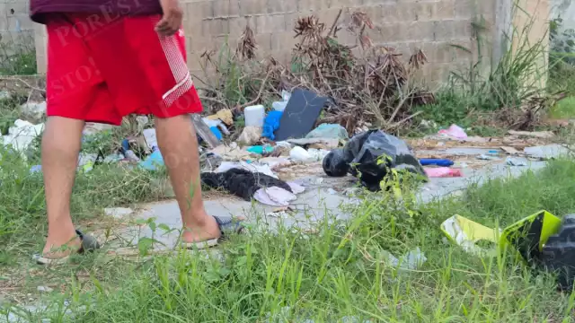 Vecinos de Nueva Jerusalén denunciaron un tramo del embanquetado convertido en basurero.