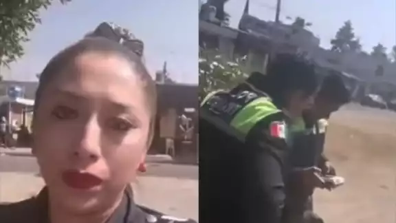 Mujer policía llora al ser multada por estacionarse en lugar prohibido Mujer policía llora al ser multada por estacionarse en lugar prohibido
