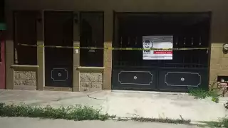 La vivienda quedó asegurada con cintas y la calcomanía respectiva de la FGE