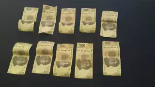 Los detenidos tenían en su poder al menos 10 billetes más de 500 pesos