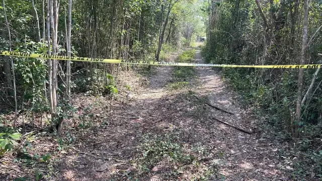 El cuerpo hallado presentaba una herida por arma de fuego en el cráneo