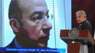 AMLO reta a Calderón a presentar denuncia en EU por juicio de García Luna