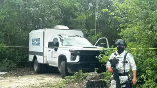 Hallan dos cuerpos maniatados en Cancún