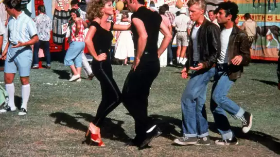 John Travolta y Olivia Newton-John fueron los protagonistas de Grease, dando vida a Sandy Olsson y a Danny Zuko John Travolta y Olivia Newton-John fueron los protagonistas de Grease, dando vida a Sandy Olsson y a Danny Zuko