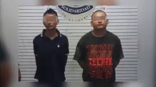 Los dos hombres detenidos en el fraccionamiento Villas del Sol de Playa del Carmen fueron llevados a la FGE Quintana Roo