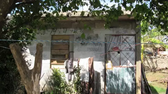 El cuerpo fue encontrado en esta casa El cuerpo fue encontrado en esta casa