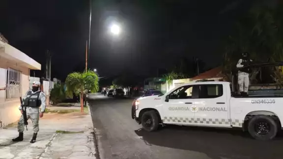 Elementos de la Guardia Nacional acordonaron la zona mientras se realizaba el cateo