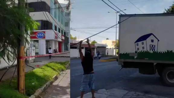 La camioneta de la empresa Kaki siguió su camino luego del accidente sin que su chofer se hiciera responsable de los daños causados en Cozumel La camioneta de la empresa Kaki siguió su camino luego del accidente sin que su chofer se hiciera responsable de los daños causados en Cozumel