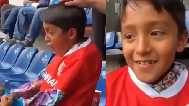 El menor de edad acudió con su papá al partido, sólo que cada uno apoyó a su equipo favorito en el Estado Azteca