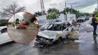 Tsuru se incendia de forma repentina sobre la avenida Chac Mool de Cancún: VIDEO
