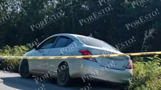 En el interior del automóvil fueron localizados un hombre y una mujer, quienes ya no tenían signos vitales