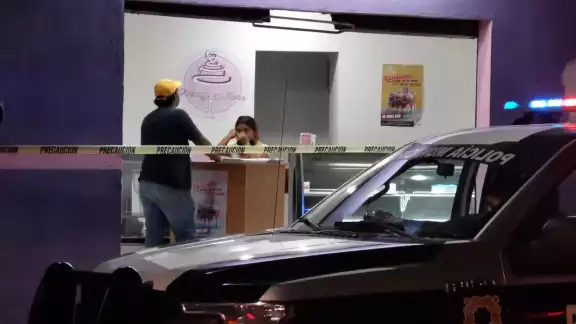 La empleada fue golpeada por el presunto asaltante La empleada fue golpeada por el presunto asaltante