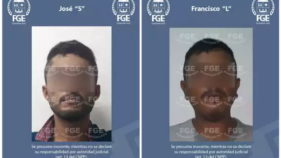 Los hombres fueron detenidos en flagrancia y con dos armas de fuego calibre 9 mm Foto: FGE Los hombres fueron detenidos en flagrancia y con dos armas de fuego calibre 9 mm Foto: FGE