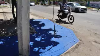 Construyen rampa para discapacitados con poste de la CFE incluido en Mérida