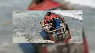 La embarcación en la que venían los migrantes quedó abandonada frente al fraccionamiento Fovissste de Isla Mujeres