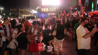 Los vacacionistas no usan cubrebocas