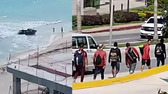 Los cubanos caminaron por el Boulevard Kukulcán de la Zona Hotelera luego de abandonar la embarcación en Playa Marlín Los cubanos caminaron por el Boulevard Kukulcán de la Zona Hotelera luego de abandonar la embarcación en Playa Marlín