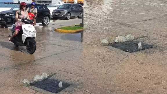 Una de las alcantarillas reboza aguas fétidas en la zona turística de Cozumel; CAPA no atiende el asunto