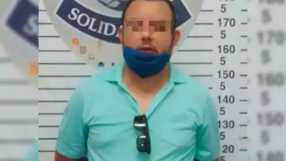 El detenido podría ser acusado de extorsión, por lo que permanecerá en la Fiscalía General de Quintana Roo, sede Playa del Carmen El detenido podría ser acusado de extorsión, por lo que permanecerá en la Fiscalía General de Quintana Roo, sede Playa del Carmen