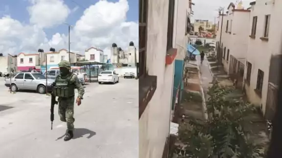 En la grabación, hecha con un celular, se ve cuando vecinos de Villas Otoch Paraíso corren para escapar de la balacera en el sitio En la grabación, hecha con un celular, se ve cuando vecinos de Villas Otoch Paraíso corren para escapar de la balacera en el sitio
